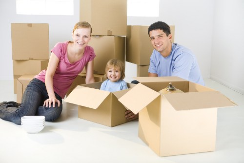 Moving team loading items safely into a van