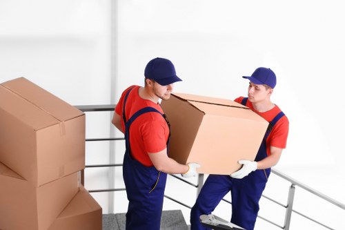 Local moving team handling boxes and furniture in Waterloo
