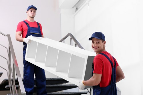 Professional house removalists in Waterloo loading furniture into a moving truck