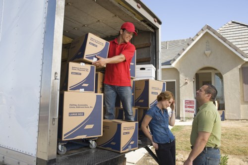 Professional movers loading boxes for Waterloo same day relocation