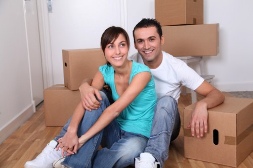 A moving crew handling boxes and furniture in Waterloo