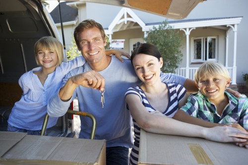 Professional movers handling large furniture during a Waterloo relocation