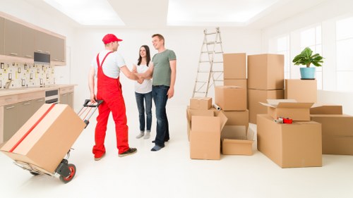 Packed moving boxes and furniture prepared for Waterloo removals