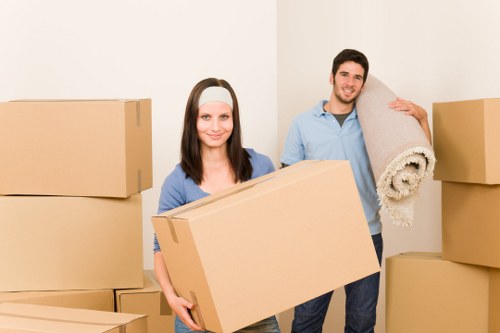 Team handling bulky furniture pick-up in Waterloo at an apartment building