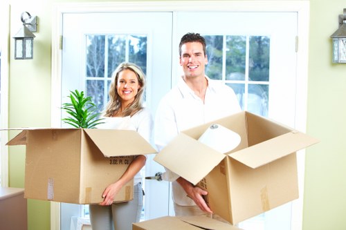 Professional movers handling business equipment in Waterloo