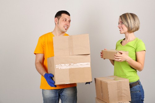 Commercial moving crew transporting office furniture in Waterloo