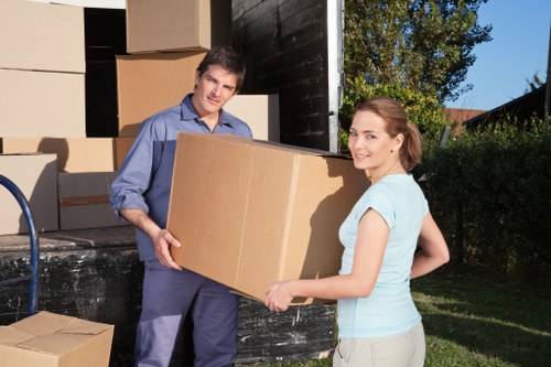 Professional furniture removal crew loading items during Waterloo pickup